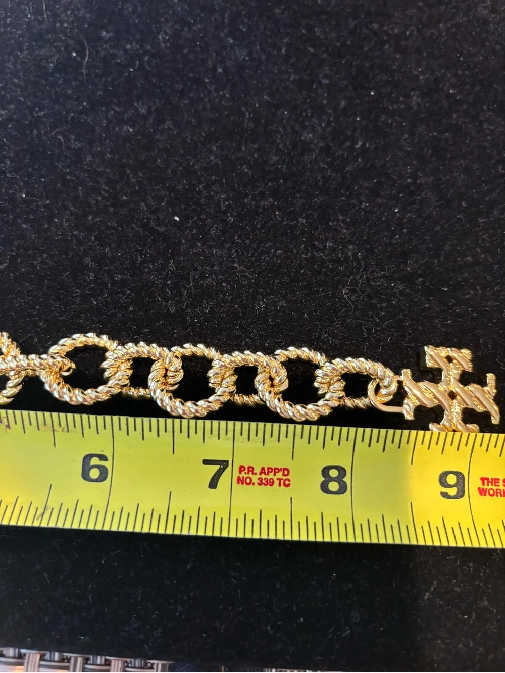 Tory Burch Gold-Tone Rope Chain Bracelet with Cross Pendant - Picture 2 of 3